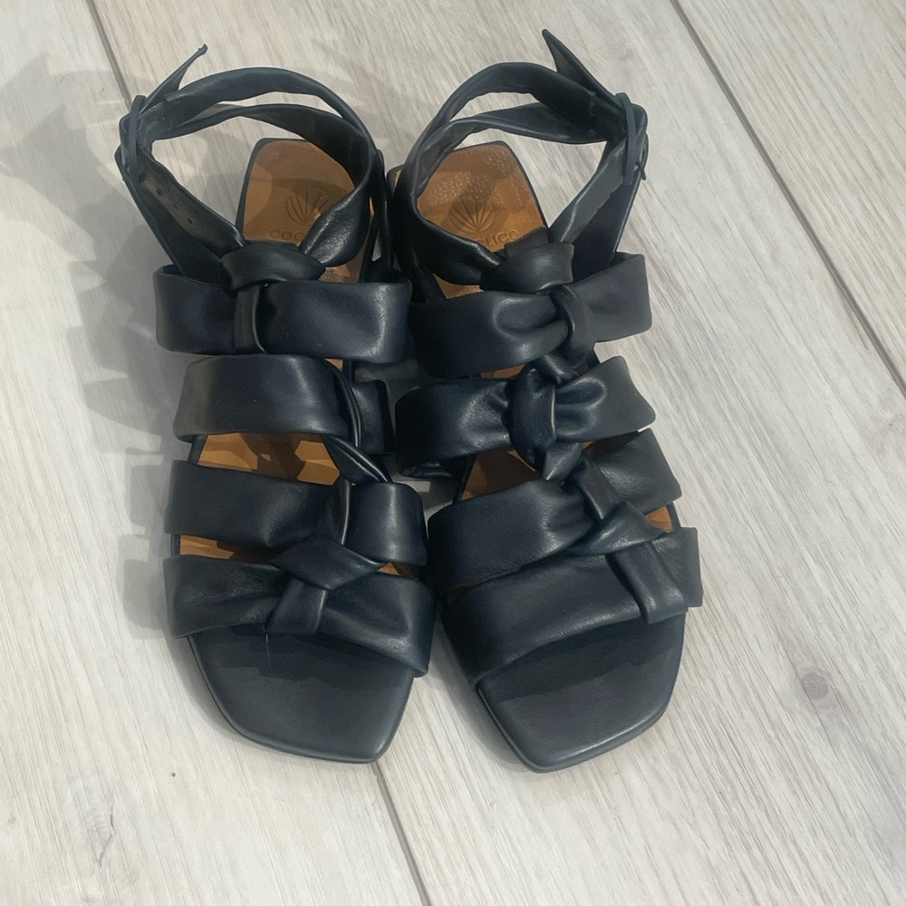 Black COCLICO flair sandals